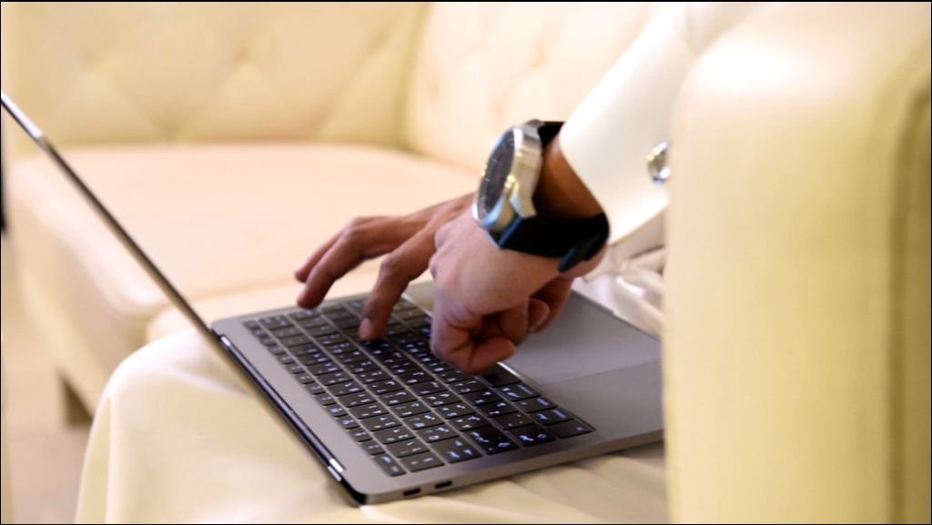 Arabic Man Working on Laptop and Mobile – Clip 1