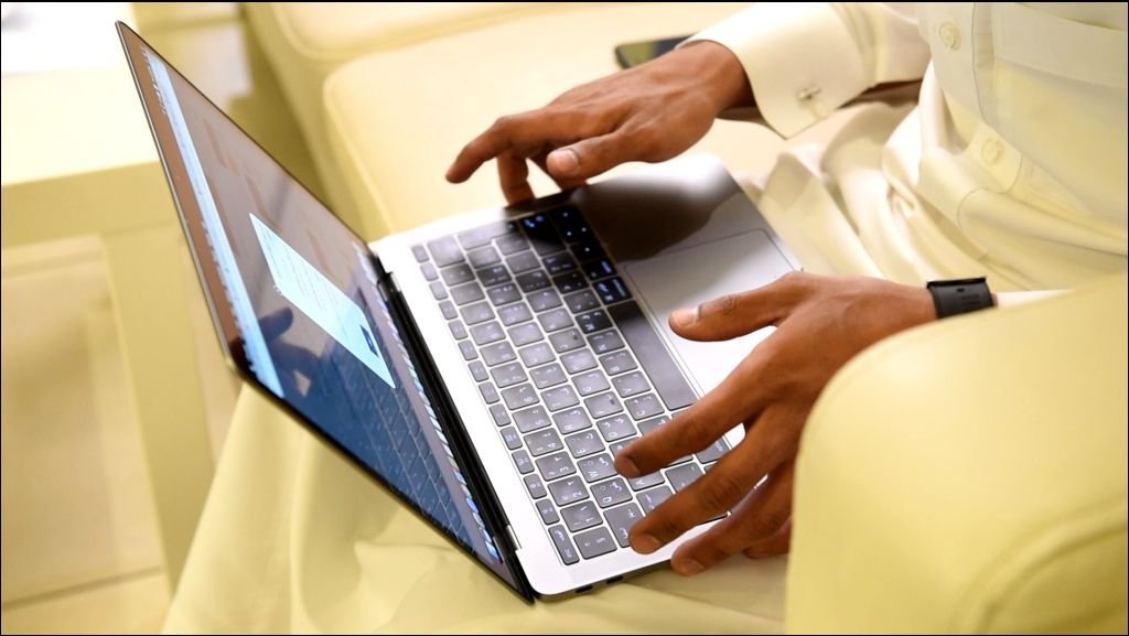 Arabic Man Working on Laptop and Mobile – Clip 20