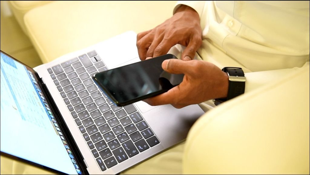 Arabic Man Working on Laptop and Mobile – Clip 21