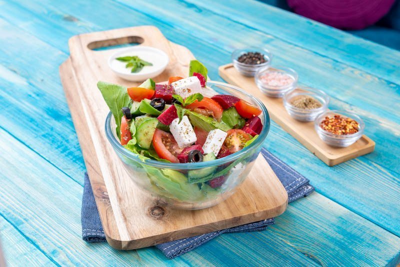 Mixed Vegetable Salads on Blue Wood Background – Healthy Food – Photo 1
