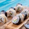 Sushi Rolls with Salmon, Rice and Cucumber – Blue Wood – Photo 2
