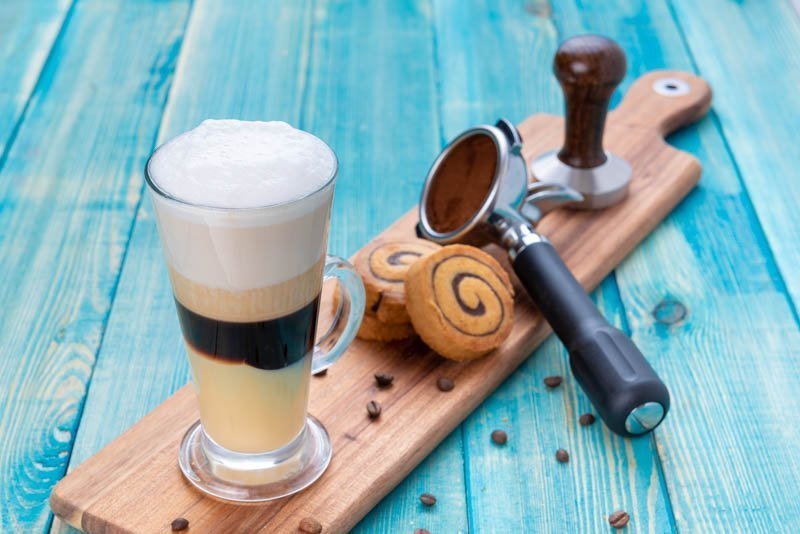 Coffee with Cream Foam, Cinnamon Rolls and Coffee Tools – Photo 1