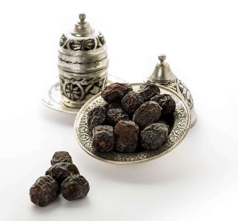 Dates Next to Arabic Coffee / Turkish Coffee - organic dates