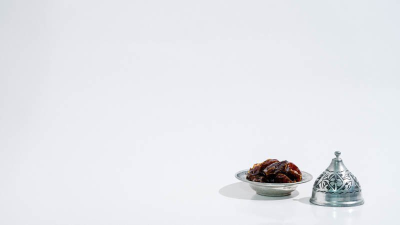 Ramadan Dates on White background. Festive Greeting Card, Ramadan Kareem