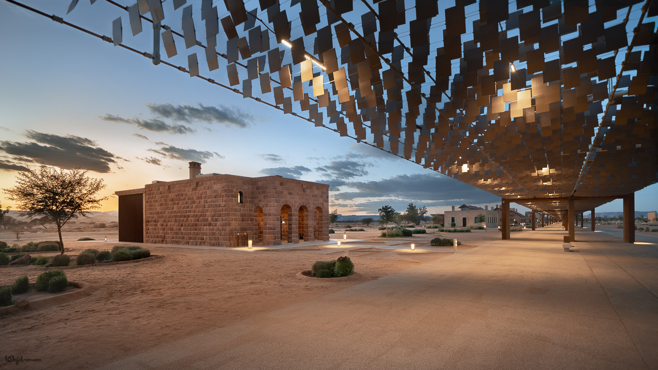 The Chedi Hegra luxury hotel exterior at AlUla, Saudi Arabia. Heritage railway station architecture repurposed into a five-star hospitality property within the UNESCO World Heritage Site of Hegra (Mada'in Salih). Hotel architecture photography by Wajd Ramadan