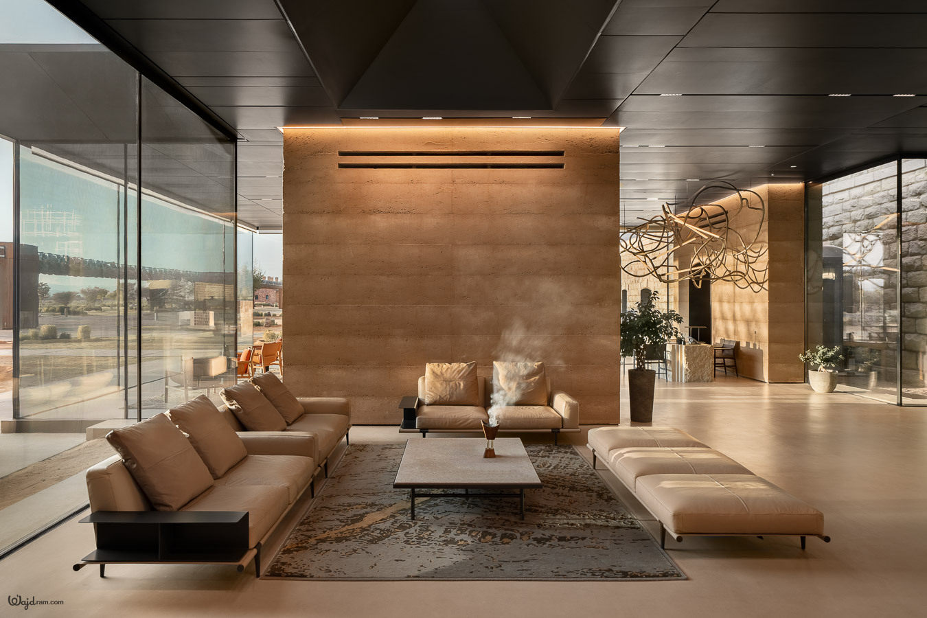 The Chedi Hegra luxury hotel exterior at AlUla, Saudi Arabia. Heritage railway station architecture repurposed into a five-star hospitality property within the UNESCO World Heritage Site of Hegra (Mada'in Salih). Hotel architecture photography by Wajd Ramadan