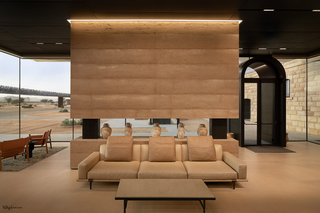 The Chedi Hegra luxury hotel exterior at AlUla, Saudi Arabia. Heritage railway station architecture repurposed into a five-star hospitality property within the UNESCO World Heritage Site of Hegra (Mada'in Salih). Hotel architecture photography by Wajd Ramadan