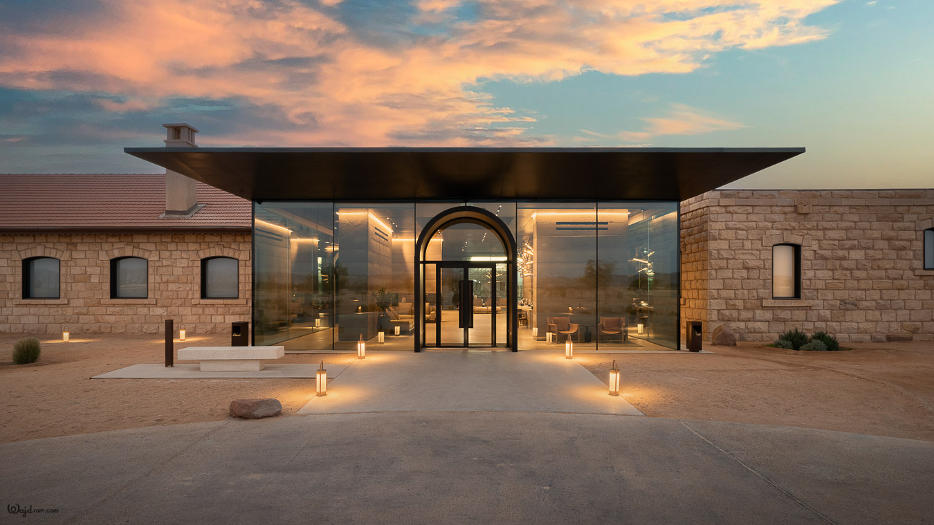 The Chedi Hegra luxury hotel exterior at AlUla, Saudi Arabia. Heritage railway station architecture repurposed into a five-star hospitality property within the UNESCO World Heritage Site of Hegra (Mada'in Salih). Hotel architecture photography by Wajd Ramadan