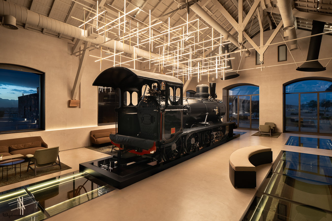 The Chedi Hegra luxury hotel exterior at AlUla, Saudi Arabia. Heritage railway station architecture repurposed into a five-star hospitality property within the UNESCO World Heritage Site of Hegra (Mada'in Salih). Hotel architecture photography by Wajd Ramadan
