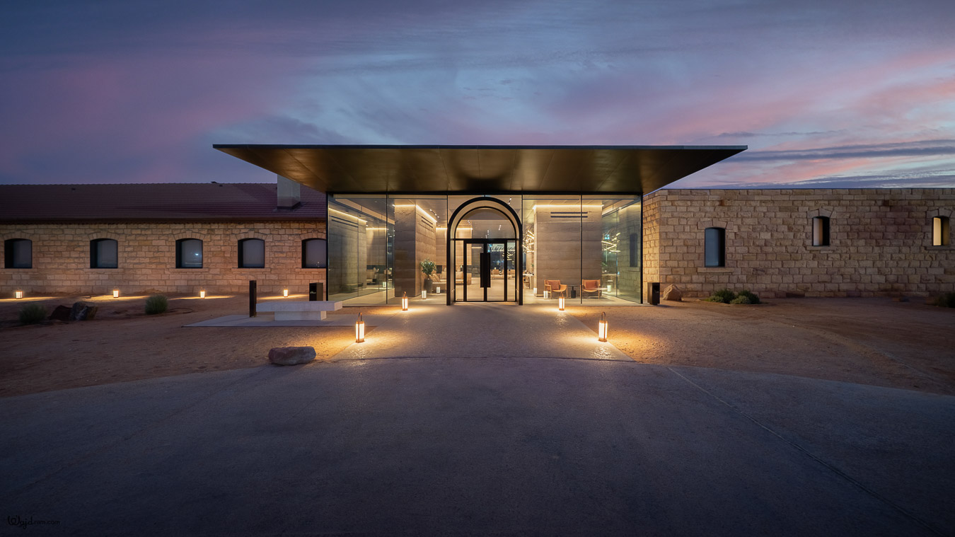 The Chedi Hegra luxury hotel exterior at AlUla, Saudi Arabia. Heritage railway station architecture repurposed into a five-star hospitality property within the UNESCO World Heritage Site of Hegra (Mada'in Salih). Hotel architecture photography by Wajd Ramadan