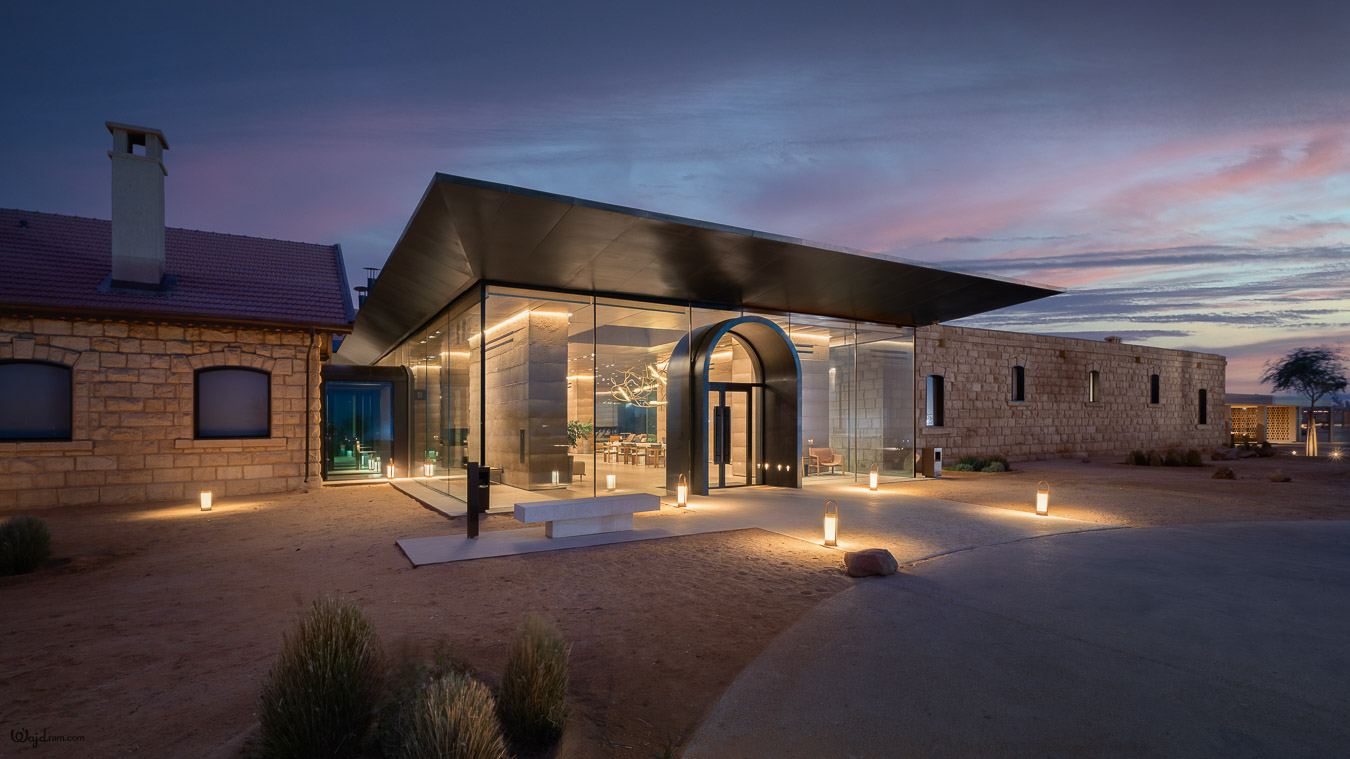 The Chedi Hegra luxury hotel exterior at AlUla, Saudi Arabia. Heritage railway station architecture repurposed into a five-star hospitality property within the UNESCO World Heritage Site of Hegra (Mada'in Salih). Hotel architecture photography by Wajd Ramadan