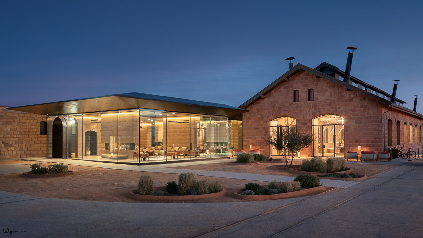 The Chedi Hegra luxury hotel exterior at AlUla, Saudi Arabia. Heritage railway station architecture repurposed into a five-star hospitality property within the UNESCO World Heritage Site of Hegra (Mada'in Salih). Hotel architecture photography by Wajd Ramadan