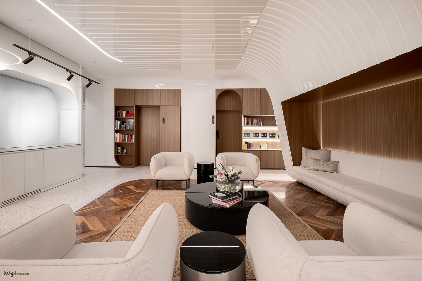 Reception and waiting area at La Clinica Dental Clinic showing sculptural seating and integrated shelving — architecture photography by Wajd Ramadan, Riyadh.